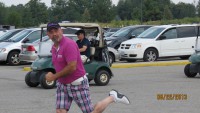 pink and plaid golfer pants on the run