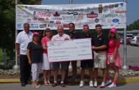 symposium golf tournament charity executive breast cancer cheque presentation 2014  20 000 from 2013