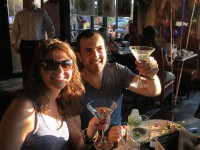 symposium cafe cambridge kitchener ontario couple celebrating with martinis