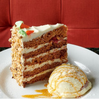 cobourg restaurant desserts including the signature carrot cake and ice cream at symposium cafe