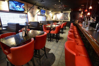 guelph restaurant bar lounge drinks area near me with large beer on tap selection at symposium cafe