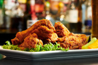 chicken wings dinner ontario restaurants at symposium bar near me